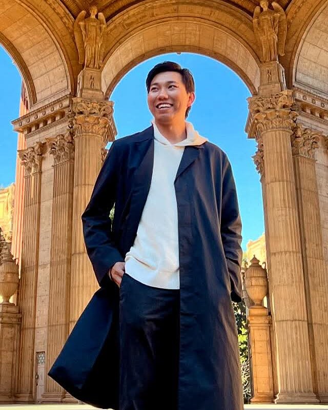Min smiling at the Palace of Fine Arts in San Francisco